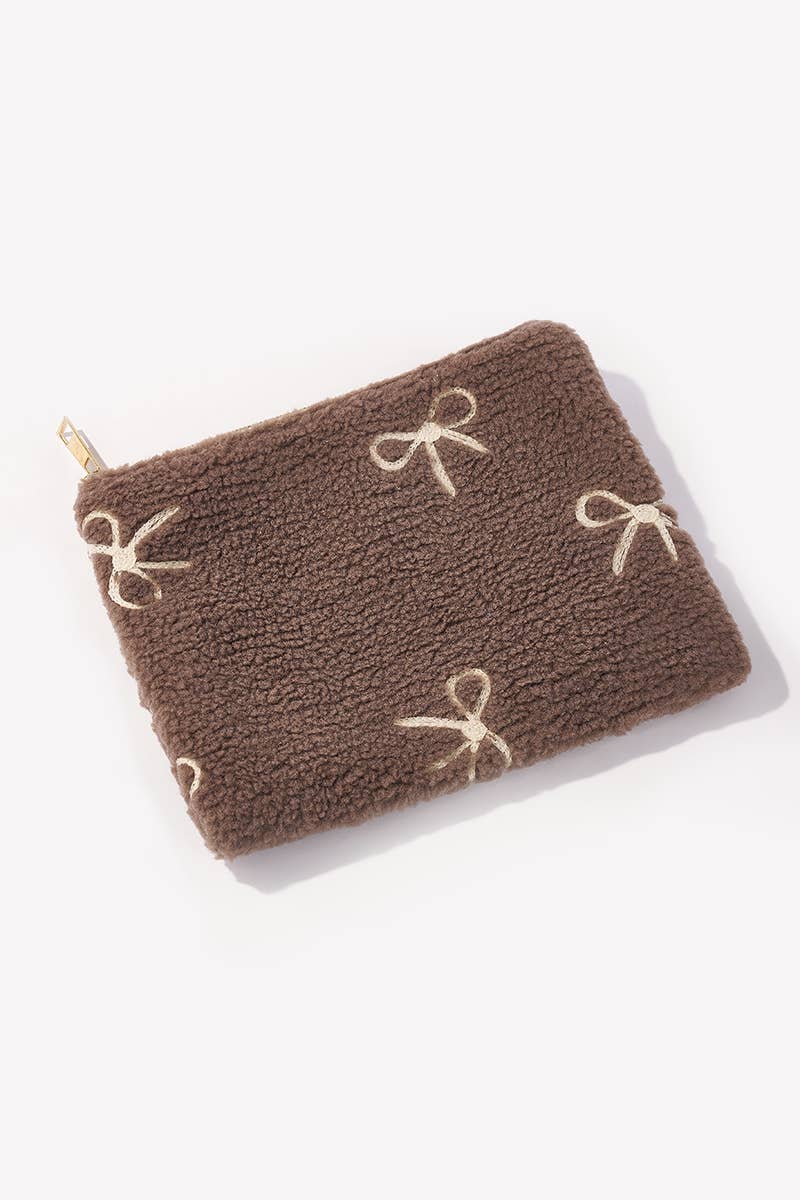 Trousse à maquillage en forme d'ourson avec nœud