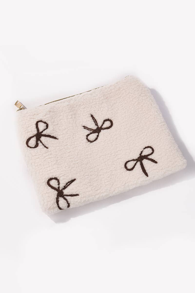 Trousse à maquillage en forme d'ourson avec nœud