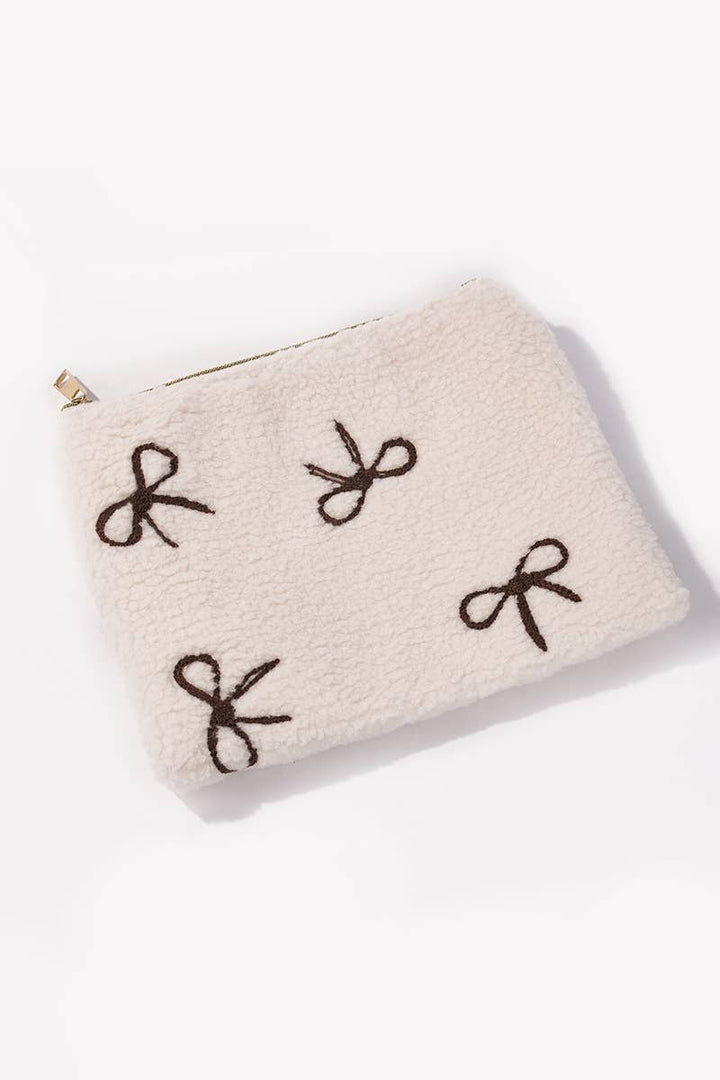 Trousse à maquillage en forme d'ourson avec nœud